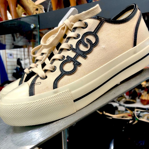 Jimmy Choo casual but luxury shoe. Used once!! Box and linen bag included.
